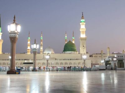 madinah Beautiful morning view of Masjid Al Nabawi, Medina's green dome, minarets and mosque courtyard.